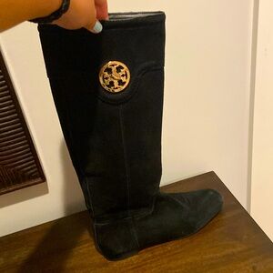 I am selling Tory Burch black heeled boots that are size 7.